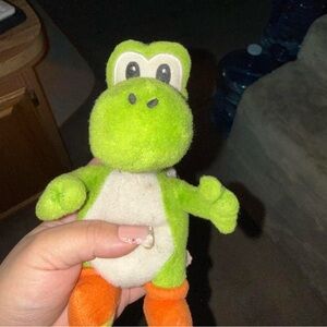 Green and Orange Plush Dinosaur Toy